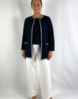 Lange vest van Anneclaire met bicolor bies.