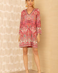 Korte roze bloemen jurk in matte jersey uit de herfstcollectie van Hale Bob.