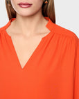 Marc Cain soepelvallende blouse met sierknoop – Tigerlily