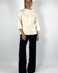 Elegante trui van Natan met turtle neck in gebroken wit.