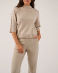 Trui met breidetails van Oscar the collection in beige