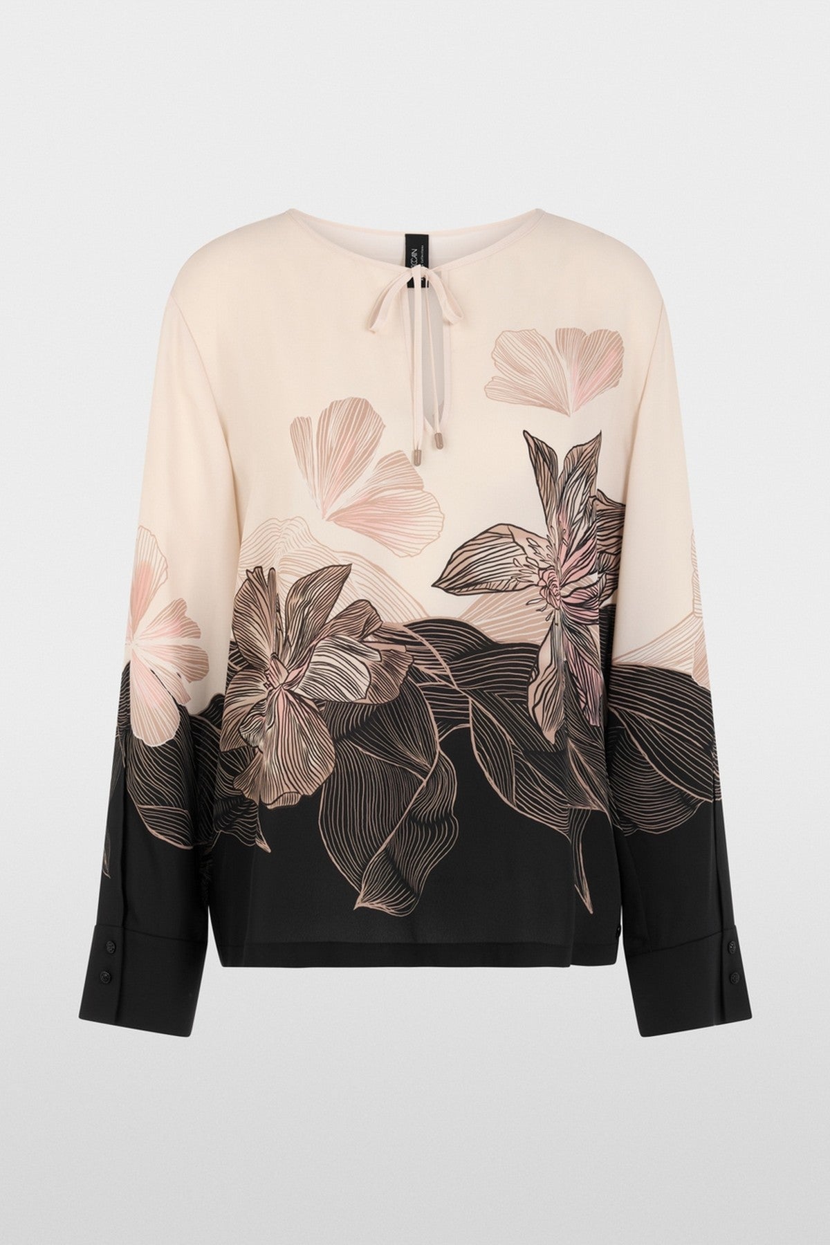 Losjes gesneden tuniekblouse met V-hals, strikbandje en all-over bloemenprint. Boxy-vorm, soepel vallend en duurzaam geproduceerd.