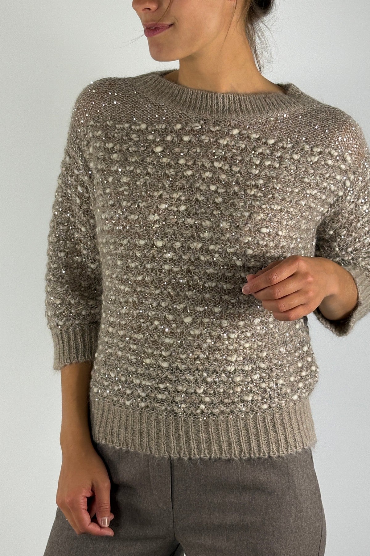 D.Exterior beige ecru pull in Deserto met reliëfpatroon en subtiele pailletten