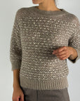 D.Exterior beige ecru pull in Deserto met reliëfpatroon en subtiele pailletten