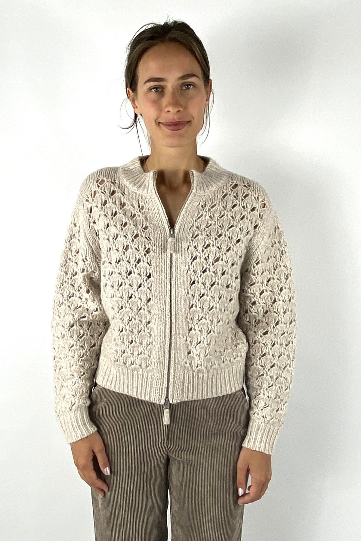 Luxueuze gebreide blousonvest in beige met rits.