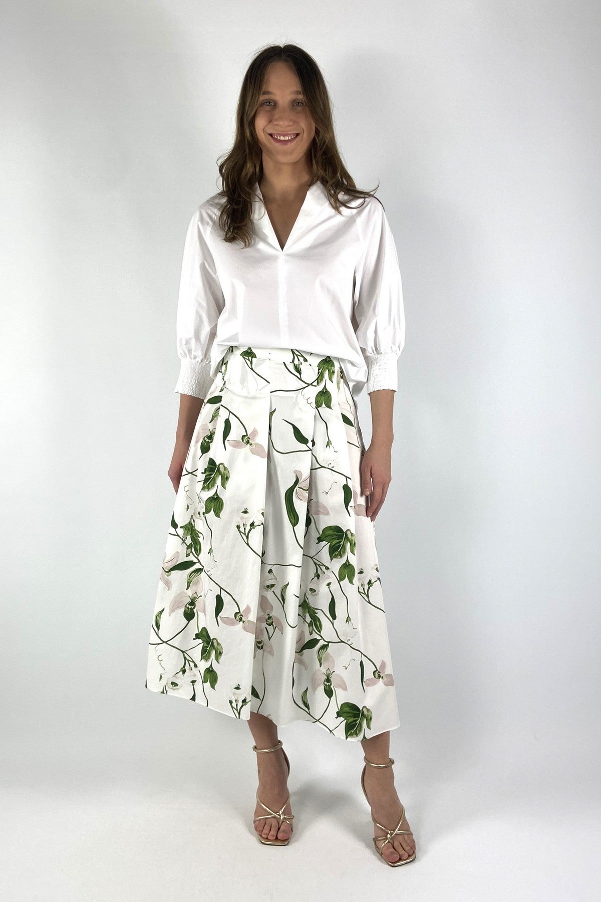 Wit-groene katoenen Epi rok van Natan voorzien van een gedetailleerde irisbloemenprint en elegante plooien voor extra volume.